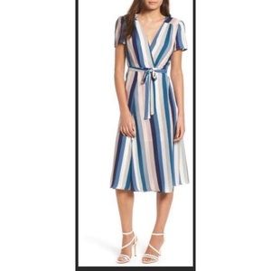 New without tag. Beautiful wrap dress. Size Xl